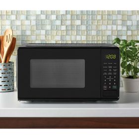 0.7 cu. ft. Countertop Microwave Oven, 700 Watts, White, New (Actual Color: Black)